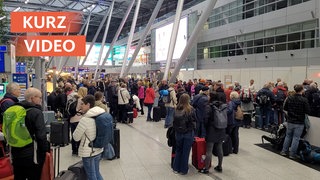 Passagiere am Düsseldorfer Flughafen 