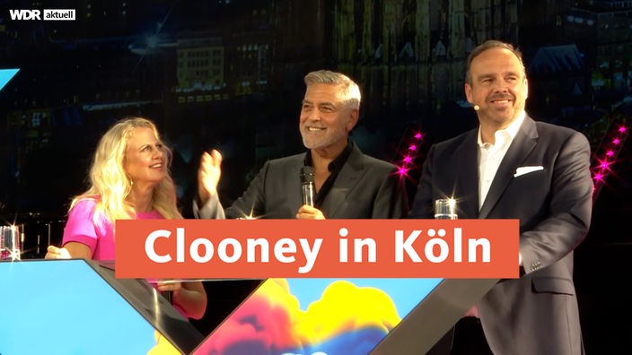 Schauspieler George Clooney in Köln bei der Ausstellung zur Digitalisierung "Digital X"