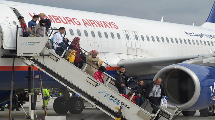 Flüchtlinge kommen in Hannover an