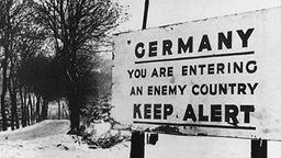 Warnschild an der deutschen Grenze bei Aachen