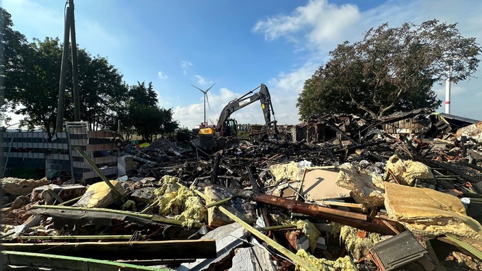 zu sehen ist ein Wohnhaus, welches von einer Explosion betroffen ist 