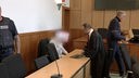 Gerichtsräume im Hagener Landgericht mit Anwalt, Angeklagtem und Justizbeamten