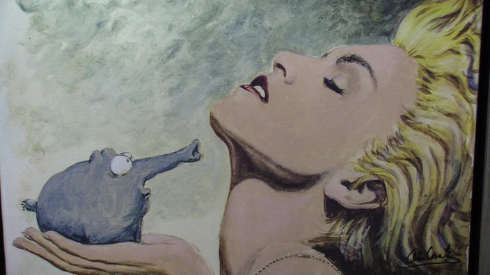 Ottifant trötet Marilyn Monroe die Haare nach hinten
