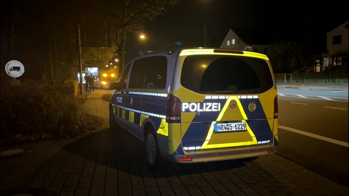 Ein Polizeiauto am Einsatzort