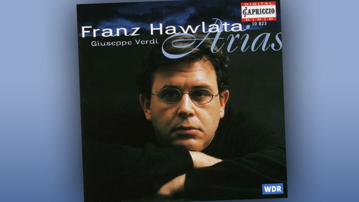 Auf dem Cover der CD ist ein Portrait von Franz Hawlata zu sehen. Sein Kopf ruht auf seinen verschränkten Armen.