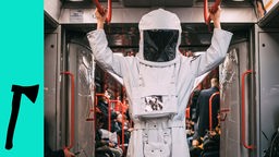 Ein Astronaut im Zug.