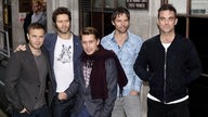 Mitglieder der Boyband "Take That" im Jahr 2010