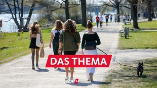 Spaziergänger am Aasee (Münster) bei warmem Frühjahrswetter