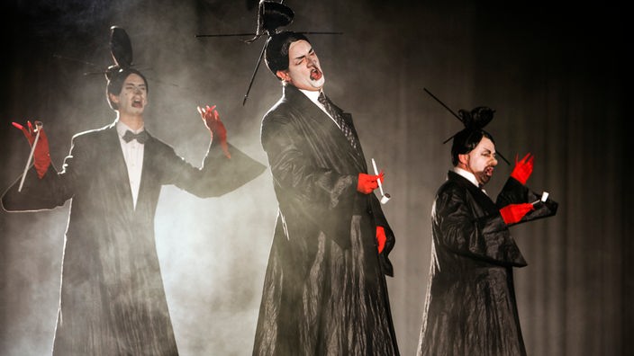 Die drei Minister (Wolfgang Stefan Schwaiger, Martin Koch, John Heuzenroeder (nicht i.d. besuchten Vorstellung.) in Puccinis "Turandot" an der Oper Köln 