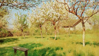 Frühlingslandschaft mit Apfelbäumen