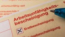 Eine Arbeitsunfähigkeitsbescheinigung (Krankschreibung)