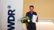 WDR Jazzpreisträger Achim Krämer bei der Urkundenvergabe