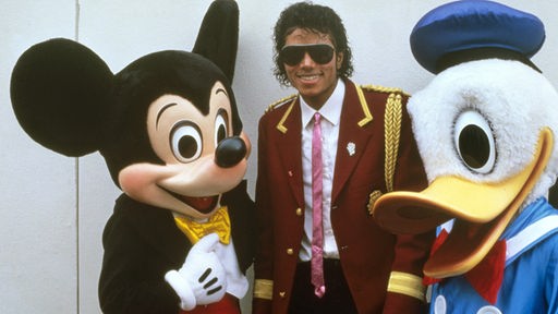 Michael Jackson mit Donald Duck und Mickey Mouse in Disneyland 1987