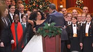 Diana Ross und Barack Obama bei einem Weihnachtskonzert 2012 in Washington