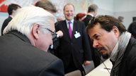 Jan Josef Liefers und Frank-Walter Steinmeier im Gespräch