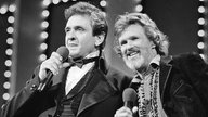 Johnny Cash und Kris Kristofferson 1983 bei den Country Music Awards in Nashville