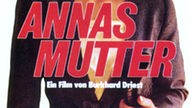 Das Filmplakat von "Annas Mutter" zeigt eine toughe Frau mit dunklen kurzen Locken in einem grauan Blazer