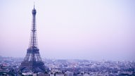 Eiffel Tower At Dusk With Paris Skyline