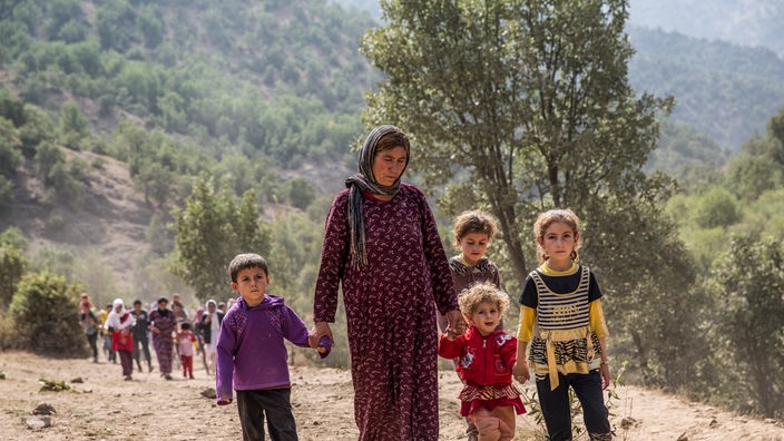 Jesiden im Irak auf der Flucht, Frau mit 4 Kindern