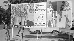 Plakatwand in Kinshas zum Kampf Muhammed Ali gegen George Foreman am 30.10.2024 