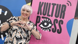  Claudia Roth (Bündnis90/Die Grünen), Kulturstaatsministerin, steht vor dem Logo "KulturPass" (14.06.2023)