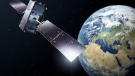 Eine Illustration zeigt einen Satelliten, der um den Planeten Erde kreist