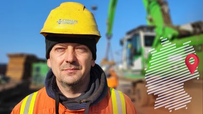 Ein Mann mit Bauhelm und Warnweste auf einer Baustelle: Valerii Kotlovoi, Stahlarbeiter aus der Ukraine