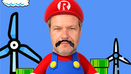 Bildmontage: Robert Habeck verkleidet als Super Mario in Game-Level mit Windrädern