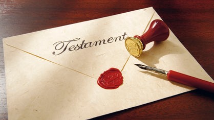 Ein Brief mit dem Schriftzug "Testament" und Wachssiegel