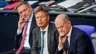 Christian Lindner, Robert Habeck und Olaf Scholz nehmen an einer Sitzung des Bundestags teil, 06.06.2024.