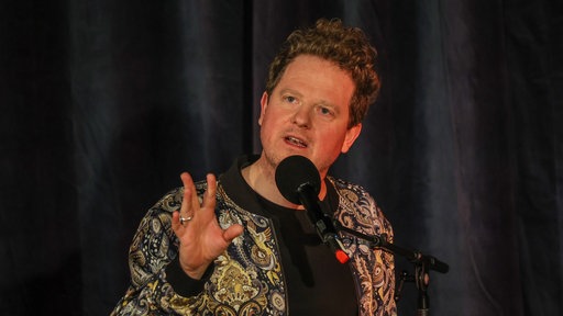 Martin Zingsheim auf der Bühne vom Theater am Dom