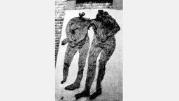 Historische Fotografie der Überreste der Moorleichen der Männer von Weerdinge