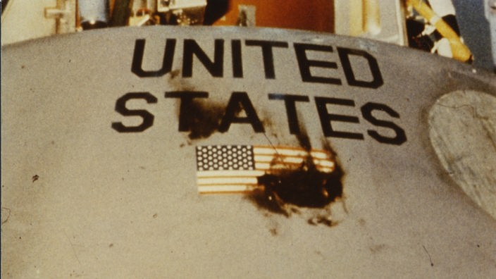 Raumkapsel, Schriftzug "United States", Brandfleck