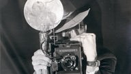 Fotograf mit Blitzlicht, 30er Jahre 