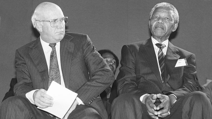 Frederik Willem de Klerk (l.) und Nelson Mandela am 14.09.1991