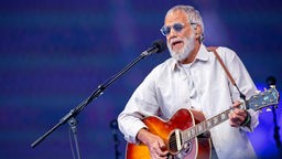 Yusuf Islam, also known as Cat Stevens, performs during Glastonbury Festival in Somerset, England, Sunday, June 25, 2023.