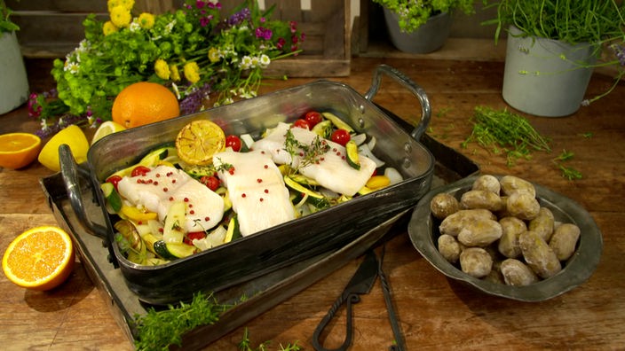 Das Bild zeigt das Gericht "Mediterraner Heilbutt aus dem Ofen mit Papas Arrugadas"