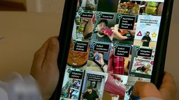 Eine Bildschirmaufnahme von TikTok, auf der Werbung für Junk Food gemacht wird