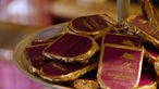 Das Bild zeigt die Schindeln aus Schokolade des Café Munding.