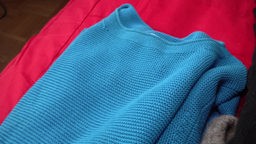 Das Bild zeigt ein Pullover