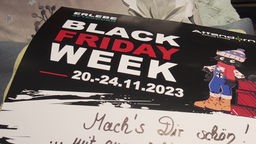 Ein Plakat, welches die Black Friday Week bewirbt