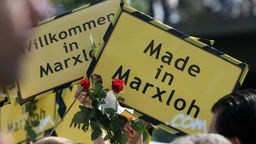 Schilder mit der Aufschrift "Made in Marxloh" und "Willkommen in Marxloh"