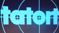 Tatort-Logo an eine Wand projiziert