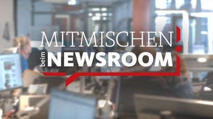Blick in den WDR-Newsroom mit Logo der Aktion "Mitmischen"